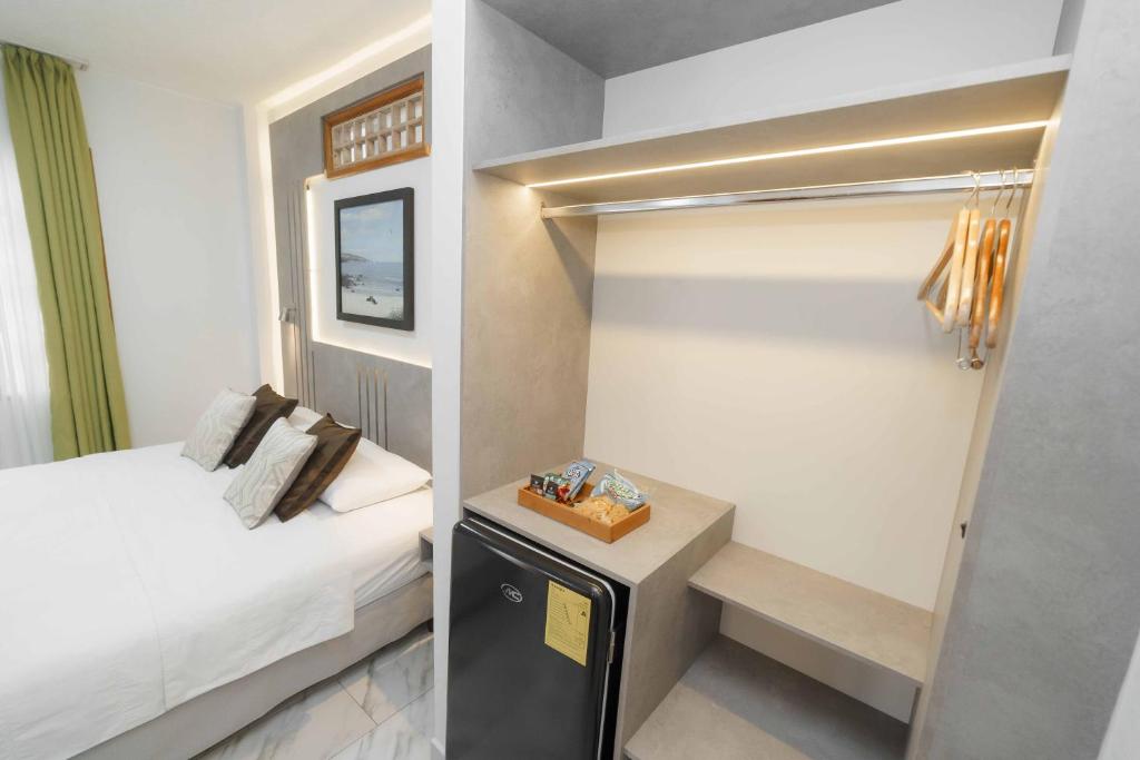 Postel nebo postele na pokoji v ubytování Hotel Santa Fe