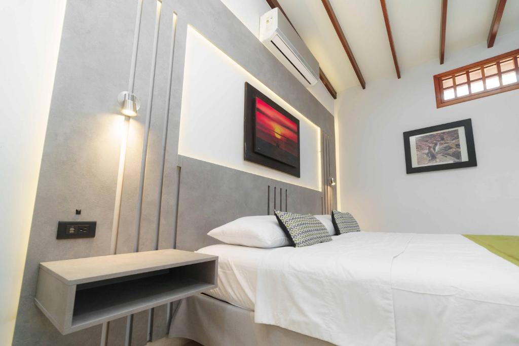 Postel nebo postele na pokoji v ubytování Hotel Santa Fe