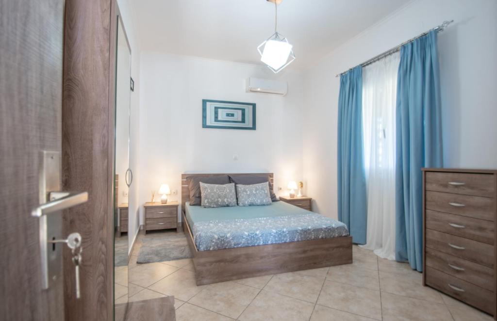 Posteľ alebo postele v izbe v ubytovaní Konstantinos holidays house