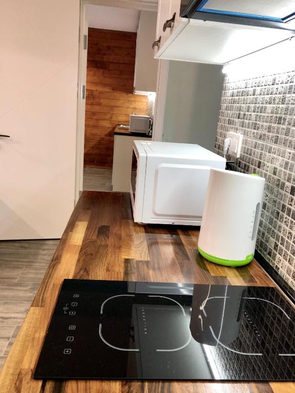 Kuchyň nebo kuchyňský kout v ubytování 2-room Apartment NFT New Gudauri Atrium Suite