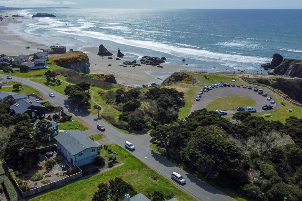 an aerial view of a road next to a beach at Ocean Aire in Bandon