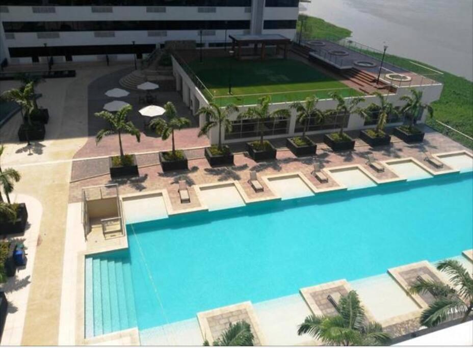 a model of a resort with a swimming pool at MiniSuite Torres Bellini Vista ThePoint in Guayaquil
