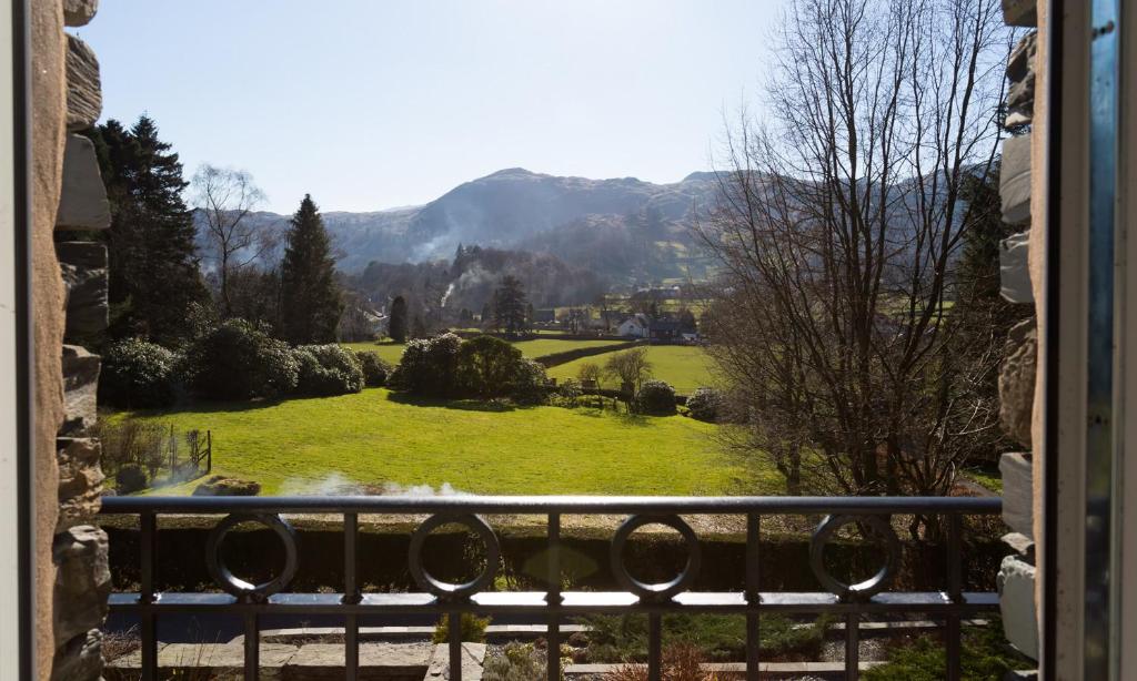 a view of a garden from a window at Fairfield Cottage in Grasmere