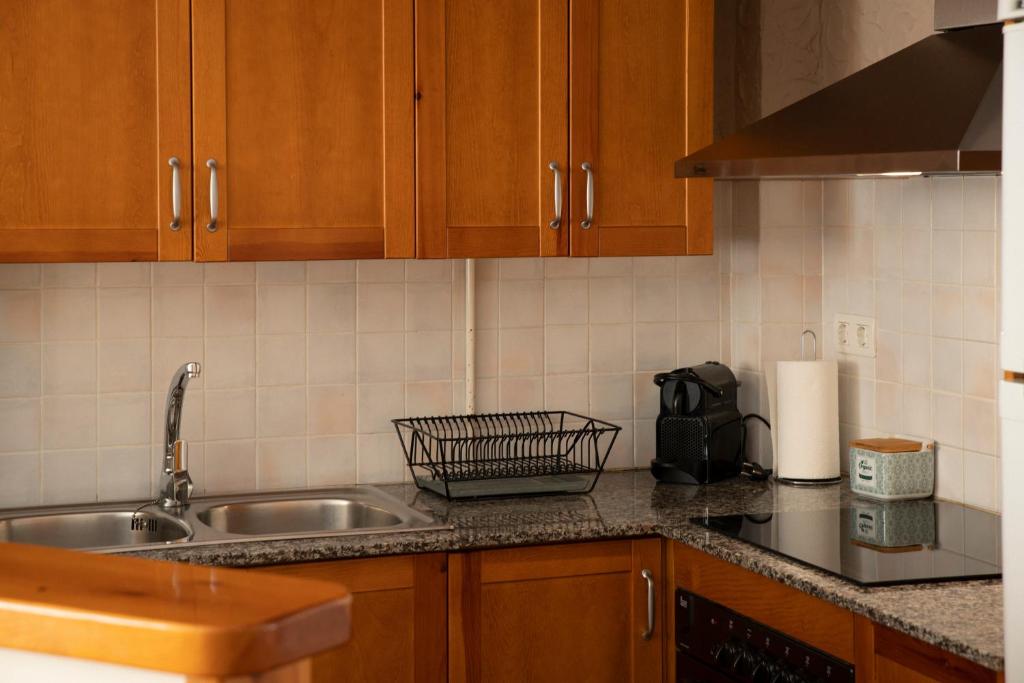 Kuchyň nebo kuchyňský kout v ubytování Apartament Cadí- Moixeró