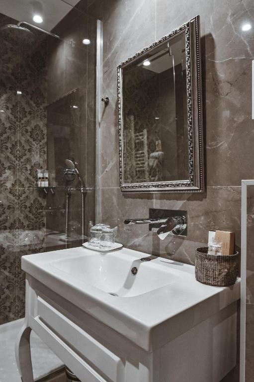 Koupelna v ubytování Garni hotel BARUT