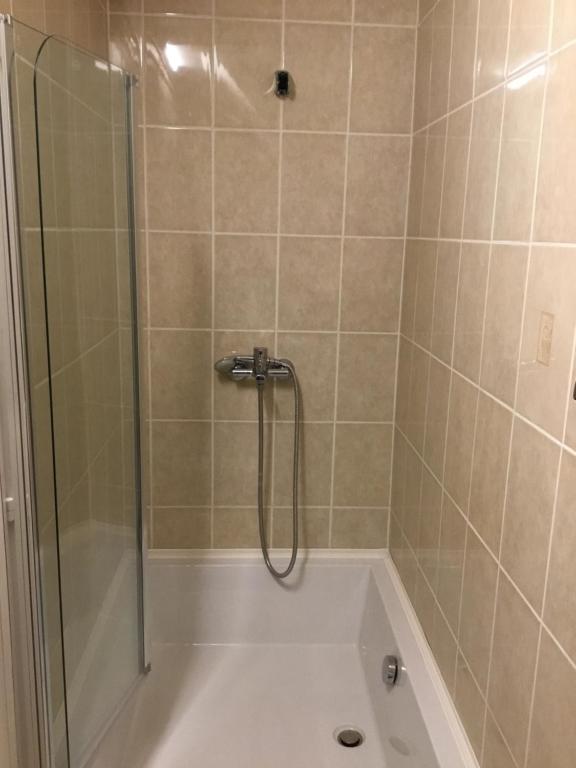 Kúpeľňa v ubytovaní Kincsem Apartman