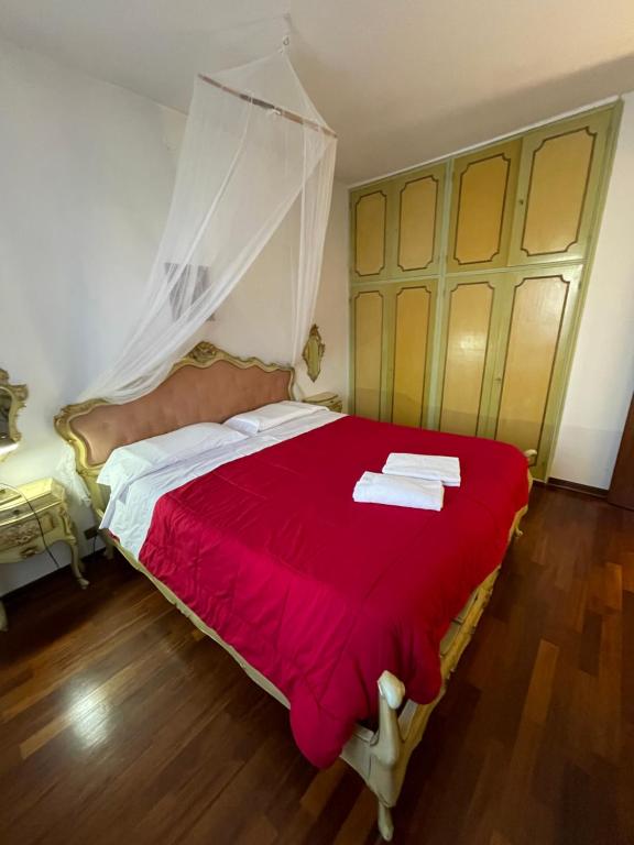 Кровать или кровати в номере Royal Guest House Venice