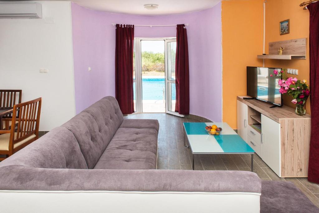 Posezení v ubytování Family friendly house with a swimming pool Cista Velika, Vodice - 20234
