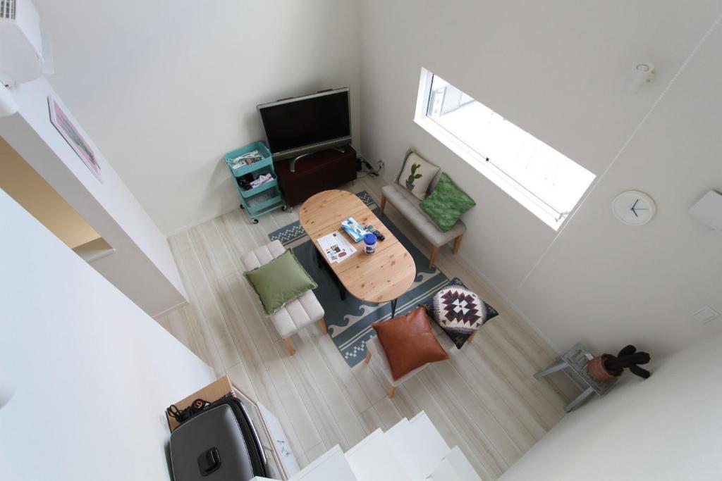 an overhead view of a living room with a television at Building A101 / Vacation STAY 1277 in Tokyo