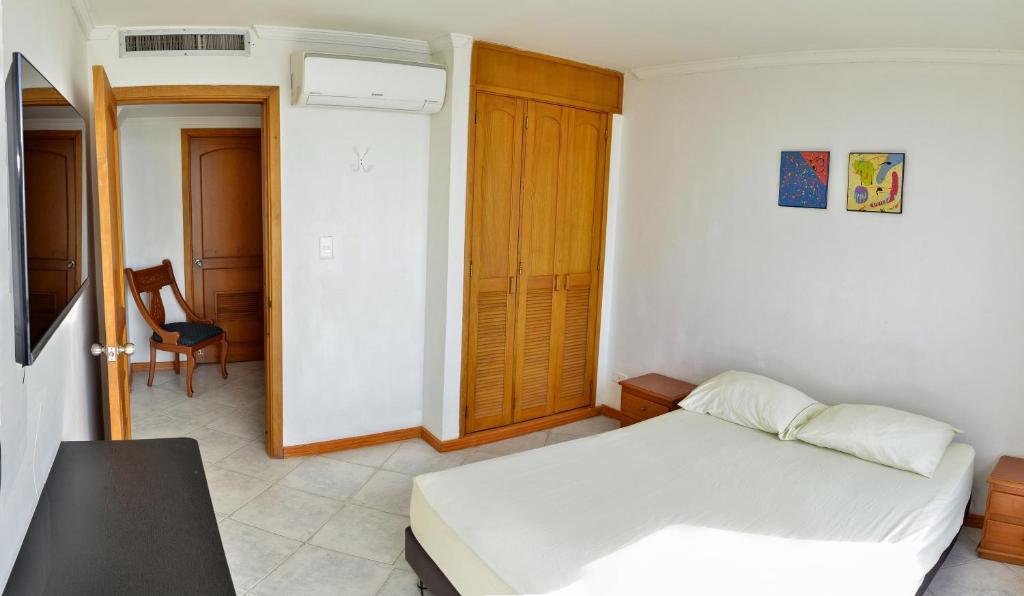 Postel nebo postele na pokoji v ubytování Apartamentos El Peñón del Rodadero VISTA AL MAR - By Apartamar Santa Marta
