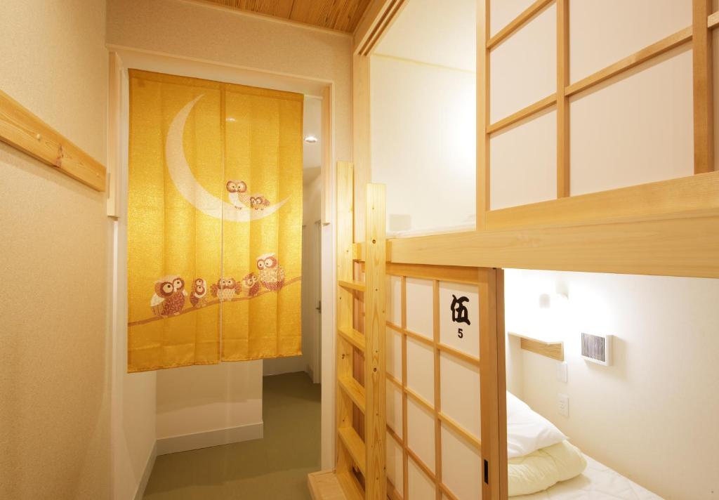 Letto o letti in una camera di Comfy Stay Sarusawaike