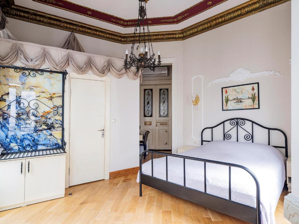 Krevet ili kreveti u jedinici u objektu Ragip Pasha Apartments