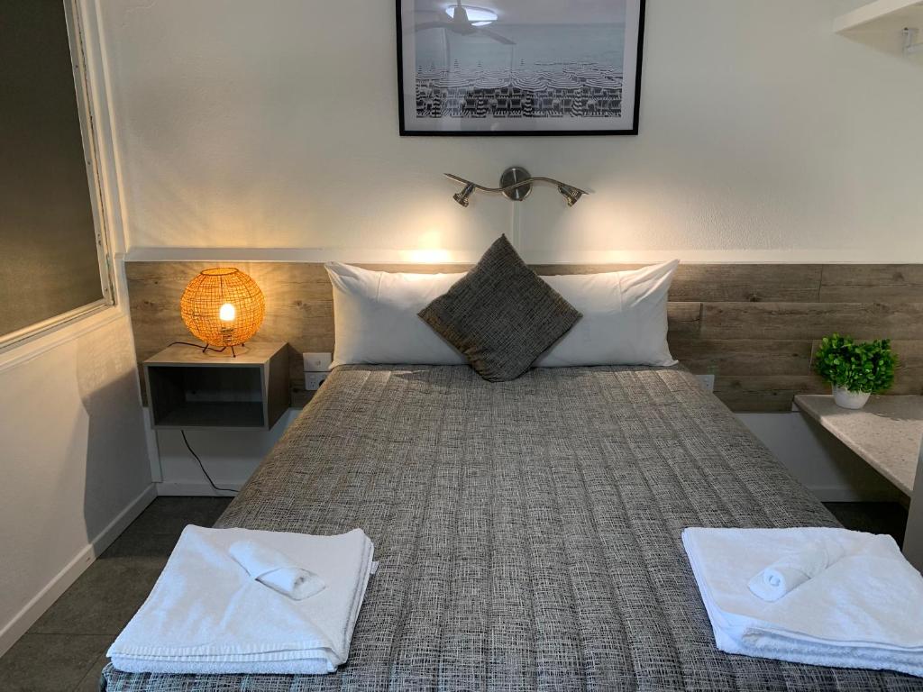 Postel nebo postele na pokoji v ubytování Y Motels Kingaroy