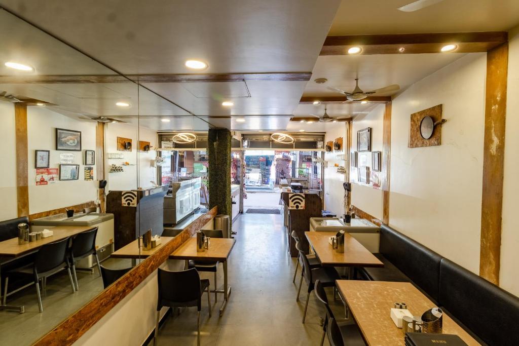 A restaurant or other place to eat at Hotel Vyankatesh & Pure Veg Restaurant