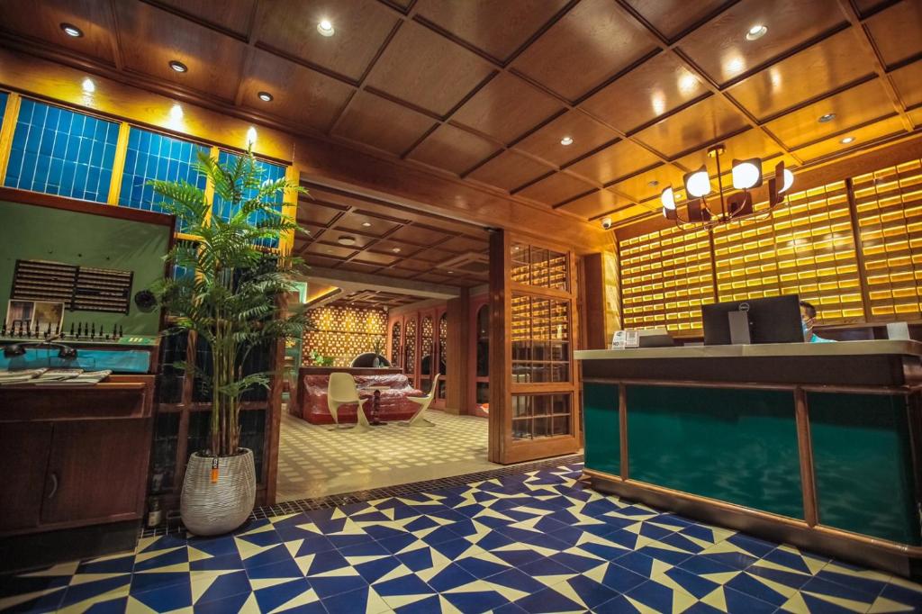 TV a/nebo společenská místnost v ubytování Miami Hotel Bangkok