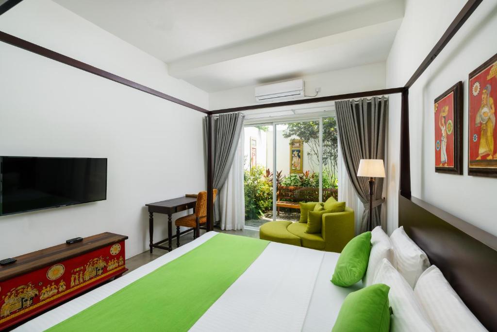 Postel nebo postele na pokoji v ubytování Angam Villas Colombo