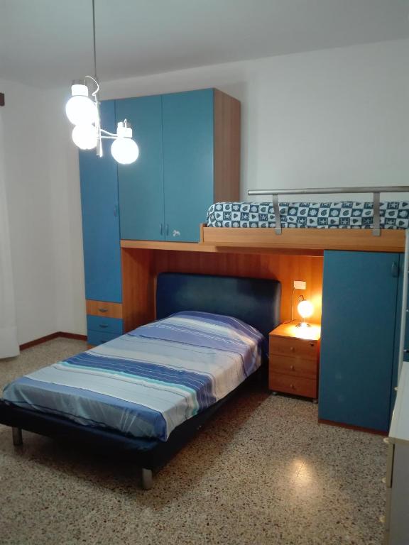 Posteľ alebo postele v izbe v ubytovaní Casa Graziella