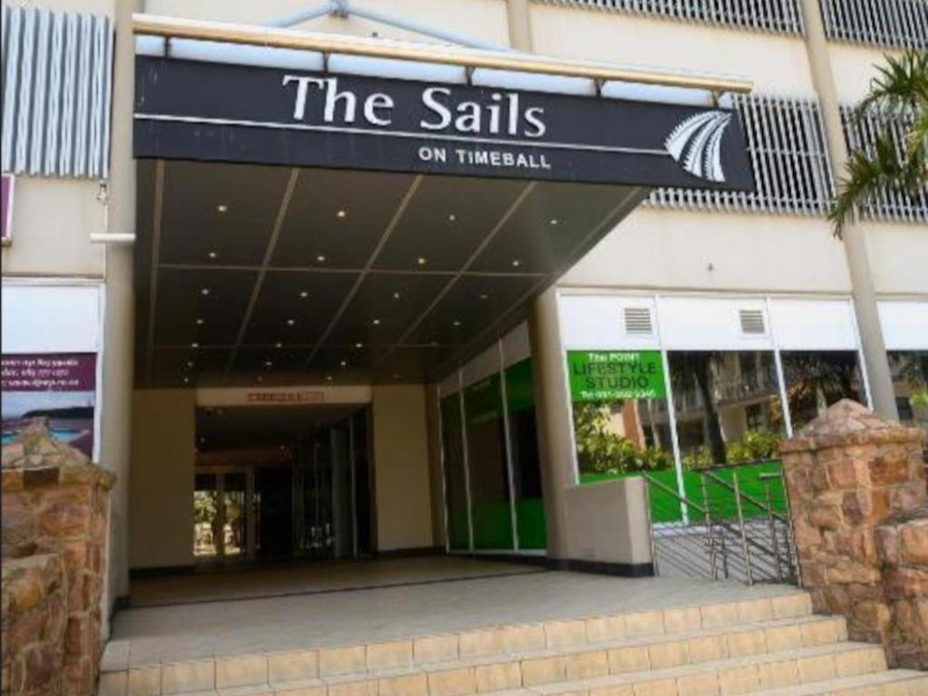 a building with a sign that reads the sills on transfer at The Sails in Durban