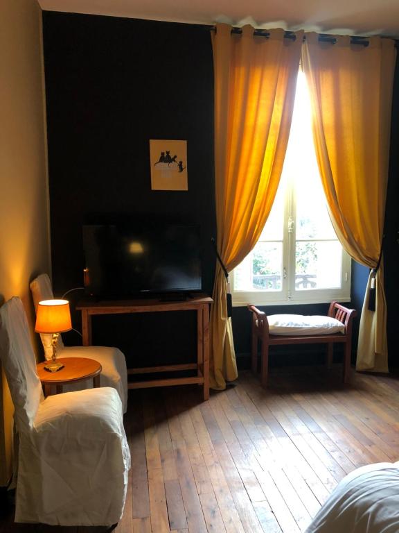 Postel nebo postele na pokoji v ubytování Maison de la Comtesse