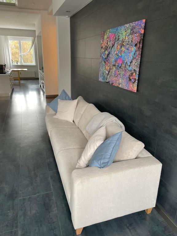 Posezení v ubytování TruRetreats Design Loft für 8 Personen I Riesige Küche I eCharger I 65z SmartTV I 150qm