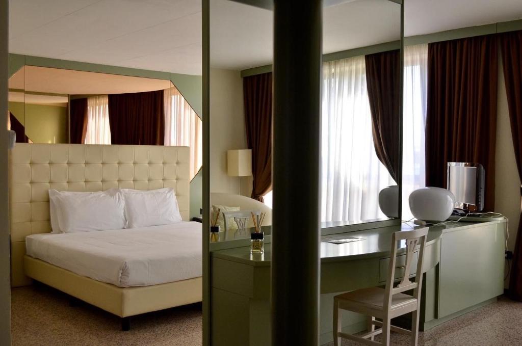 Postel nebo postele na pokoji v ubytování Hotel Diamante