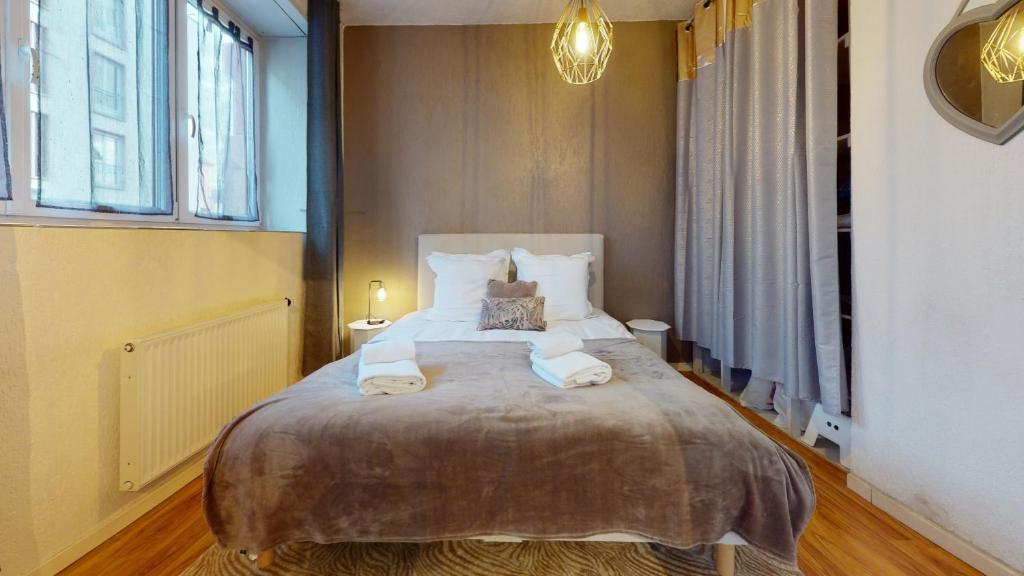 Posteľ alebo postele v izbe v ubytovaní Magic Home - Les Taillandiers