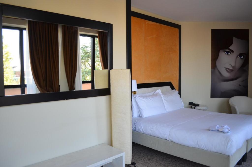 Postel nebo postele na pokoji v ubytování Hotel Diamante