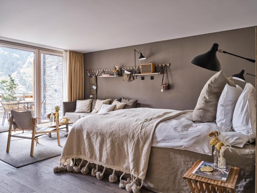 Voodi või voodid majutusasutuse CERVO Mountain Resort toas