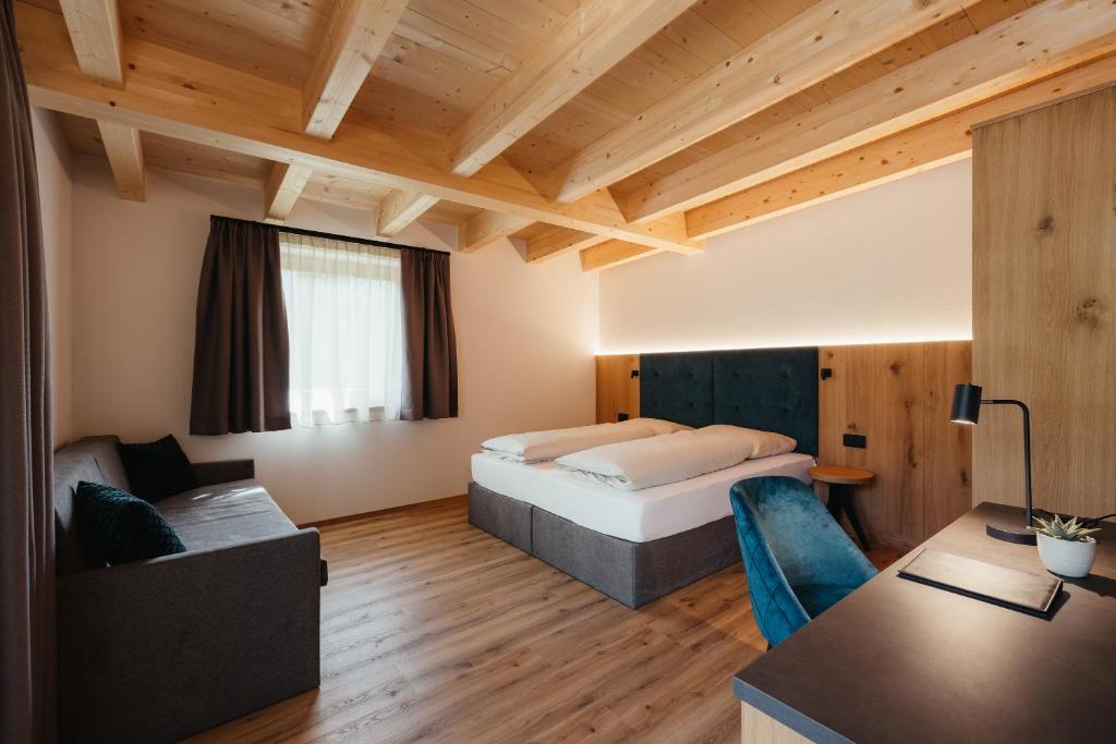 Postel nebo postele na pokoji v ubytování Aria de Munt