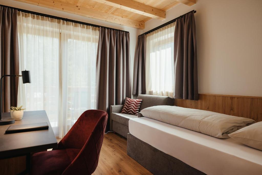 Postel nebo postele na pokoji v ubytování Aria de Munt