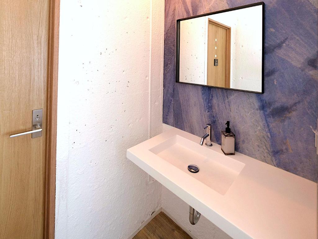 Koupelna v ubytování 宮古島 Guesthouse Re-Spect