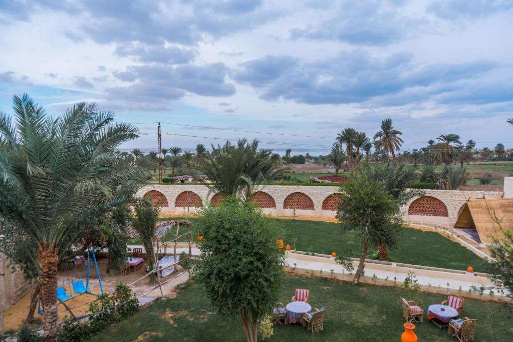 an aerial view of a resort with a playground at Zad El Mosafer Guest House in Tunis