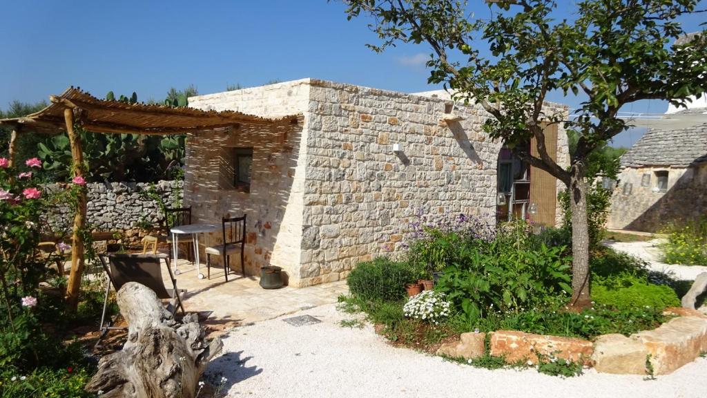 Vonkajšia záhrada v ubytovaní Trulli 18cinquantanove