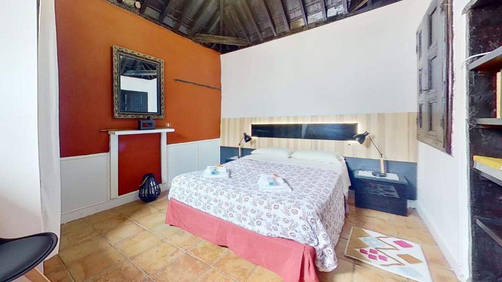 A bed or beds in a room at Remarkable 4-Bed Villa