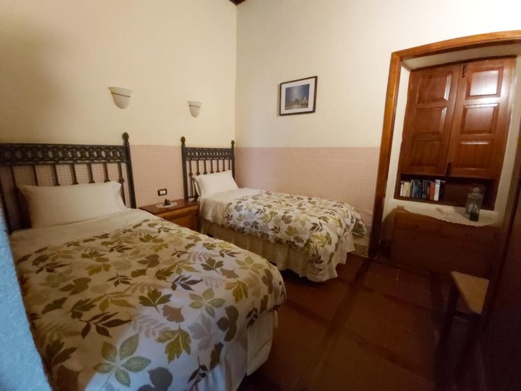 A bed or beds in a room at Remarkable 4-Bed Villa