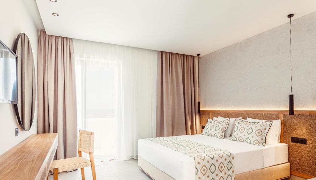 A bed or beds in a room at Blue Sea Island