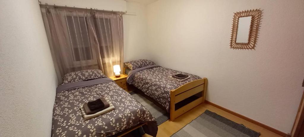 Postel nebo postele na pokoji v ubytování Casablanca