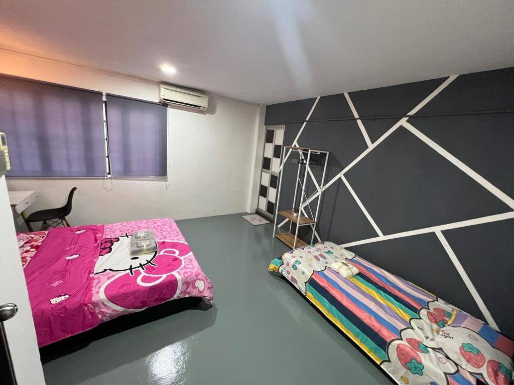 Postel nebo postele na pokoji v ubytování GD HOMESTAY
