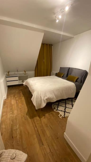 Postel nebo postele na pokoji v ubytování Charmant appartement dans l’Orne !