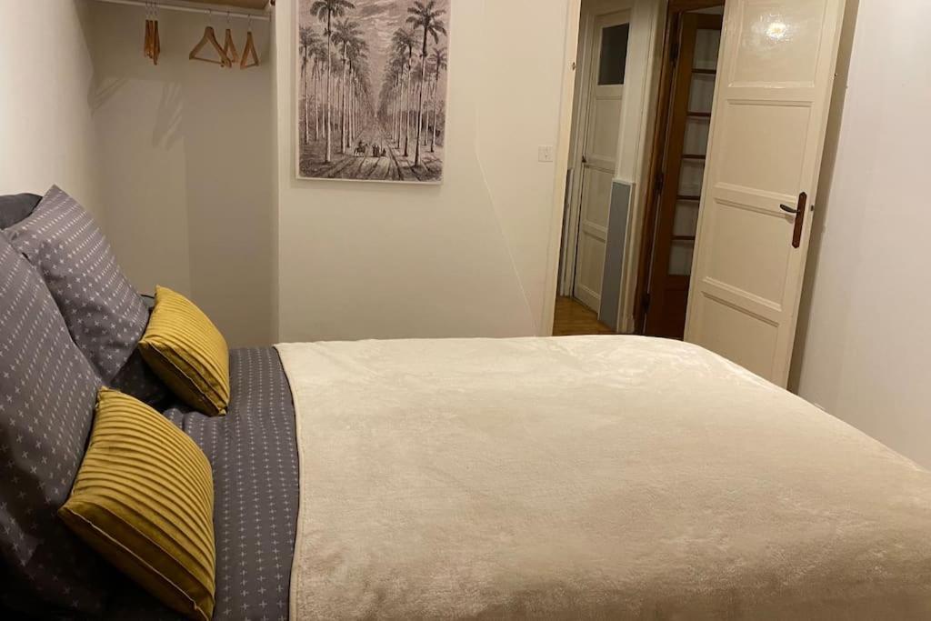 Postel nebo postele na pokoji v ubytování Charmant appartement dans l’Orne !