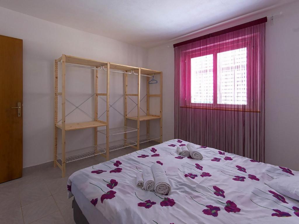 Posteľ alebo postele v izbe v ubytovaní Holiday Home Dalmatia Sokolić