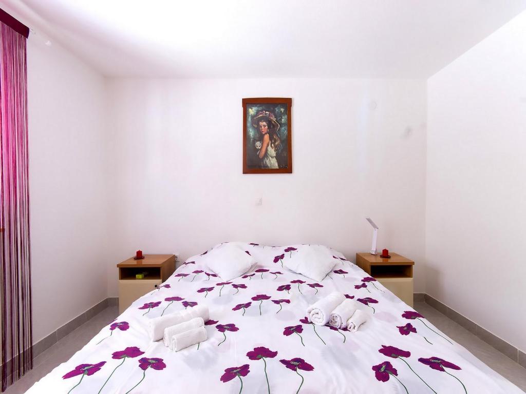 Posteľ alebo postele v izbe v ubytovaní Holiday Home Dalmatia Sokolić