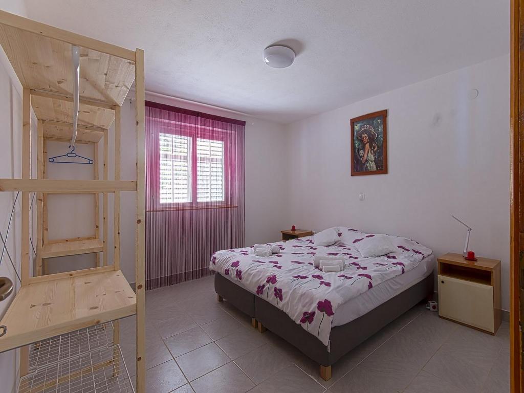 Posteľ alebo postele v izbe v ubytovaní Holiday Home Dalmatia Sokolić