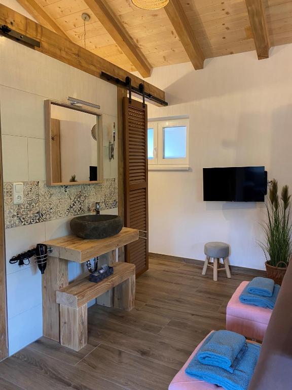 TV a/nebo společenská místnost v ubytování Hotel Sonnenlicht Maria Alm