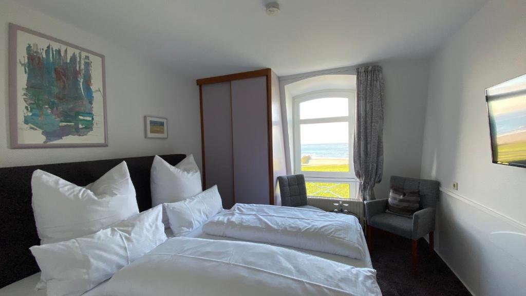 Postel nebo postele na pokoji v ubytování Strandvilla an der Kaiserwiese