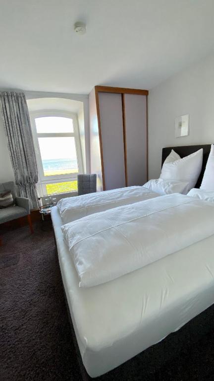 Postel nebo postele na pokoji v ubytování Strandvilla an der Kaiserwiese