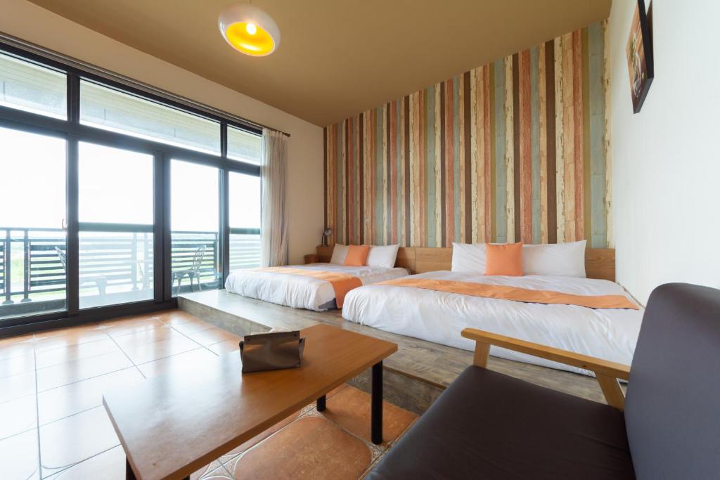 Katil atau katil-katil dalam bilik di 時光輕旅 Time INN