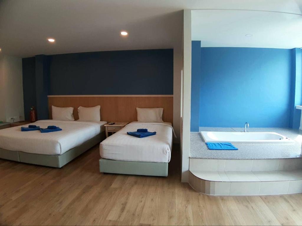 Postel nebo postele na pokoji v ubytování Karon Living Room - SHA Plus