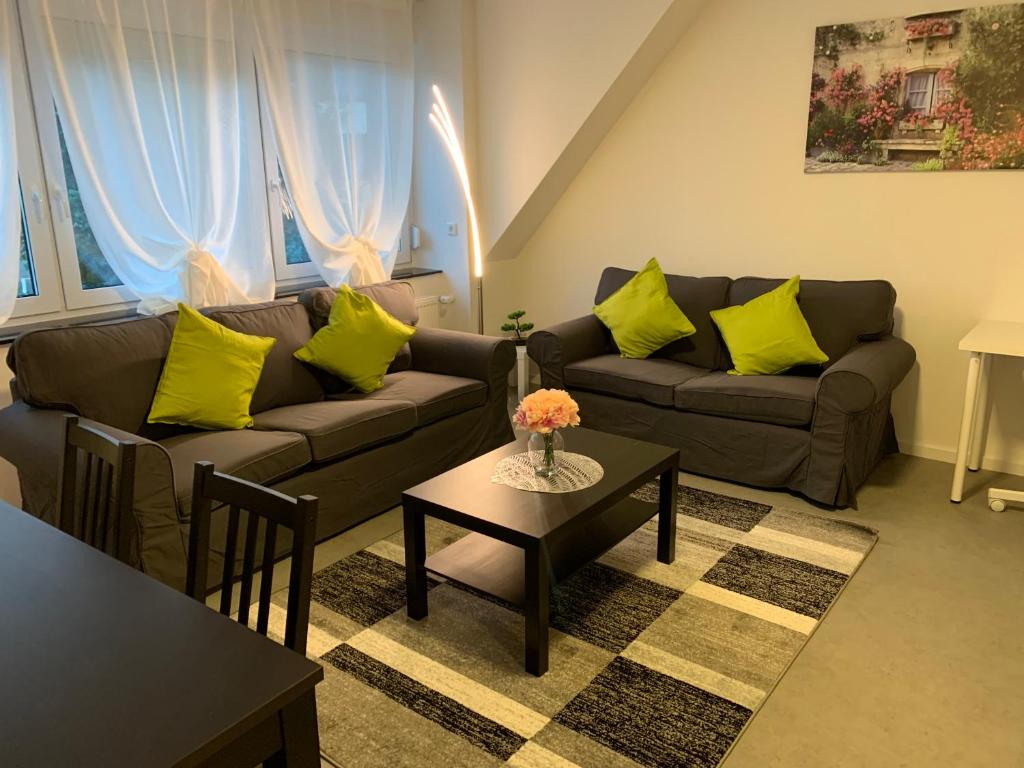 Posezení v ubytování CityApartment Platinum mit Balkon bzw,Terrasse