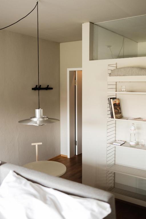 Postel nebo postele na pokoji v ubytování MÜHLENHOF ROOMS boutique bed & breakfast